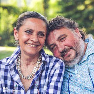 a man and a woman posing for a picture at La Locanda Della Campanara in Santa Sofia