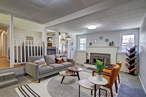 a living room with a couch and a fireplace at Wilson Circle in Boise