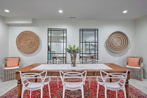 a dining room with a table and chairs at Vibrant Chic Home about 20 Mi to Salt Lake City! in Draper