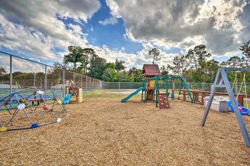 a playground with many different types of playground equipment at Direct Gulf Access and Lanai Sunny Naples Home! in Naples