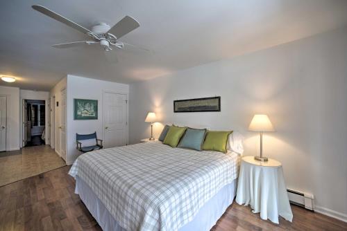 a bedroom with a bed and a ceiling fan at Bolton Landing Suite with Deck, Lake George Access in Bolton Landing