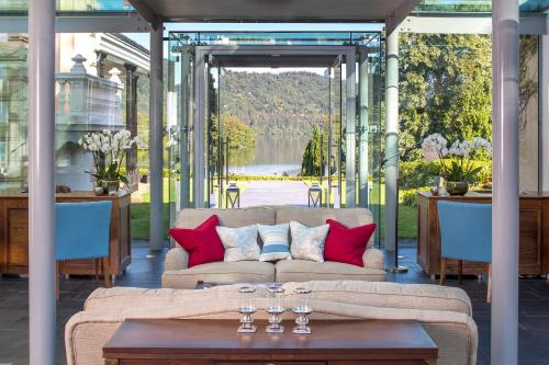 a living room with a couch and a table at The Belsfield Hotel in Bowness-on-Windermere