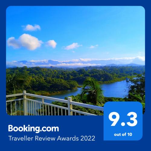 a sign that reads travel review awards at Mahaweli View Inn in Kandy