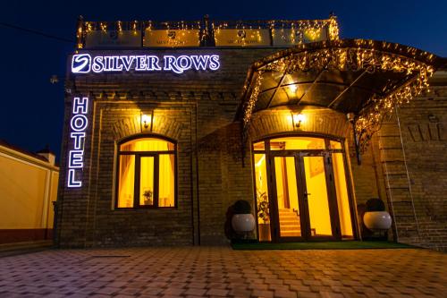 a building with a sign that reads silver rovers at Hotel Silver Rows in Samarkand
