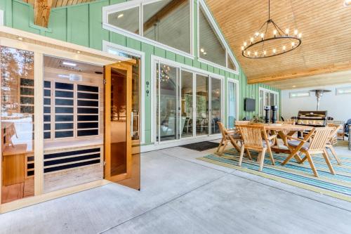 a dining room with a table and chairs at Merganser Memories in Sunriver