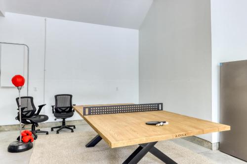 an office with a wooden table and two chairs at Merganser Memories in Sunriver