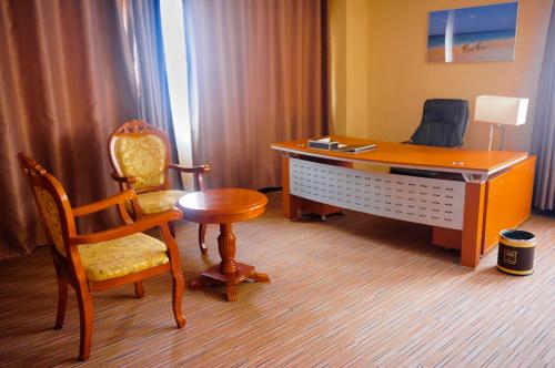 Un lugar para sentarse en 2000 Hotel Downtown Kigali