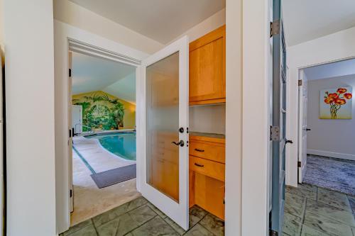 a door leading into a bathroom with a pool at The Pool House in Ferndale