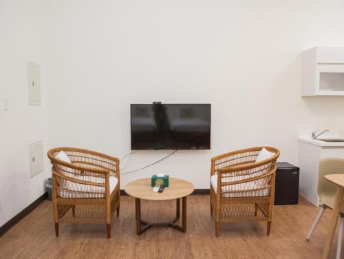 TV a/nebo společenská místnost v ubytování Happy Casa Resorts