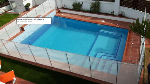 an overhead view of a swimming pool in a house at Villa Habana in El Vendrell