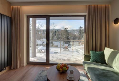 Ruang duduk di Trevilles Apartamenty - Stone Hill z basenem i SPA