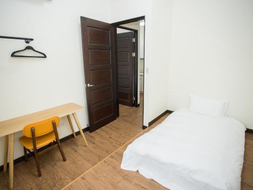 Postel nebo postele na pokoji v ubytování Happy Casa Resorts
