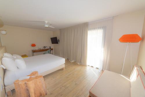 Postel nebo postele na pokoji v ubytování Boutik Hôtel 2A - Adult Only