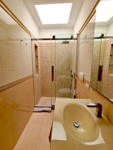 a bathroom with a sink and a shower at Blu Acquaviva in Capri
