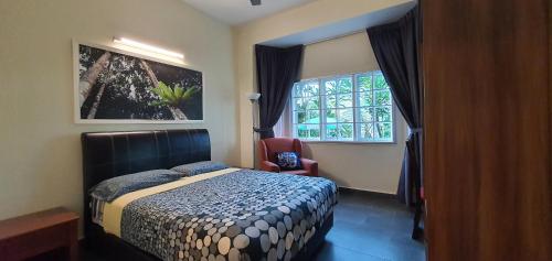 Una cama o camas en una habitación de Gerard's "Backpackers" Roomstay No Children Adults only