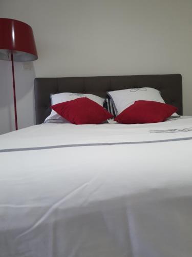 Katil atau katil-katil dalam bilik di Appart'Hôtel Luxapparts
