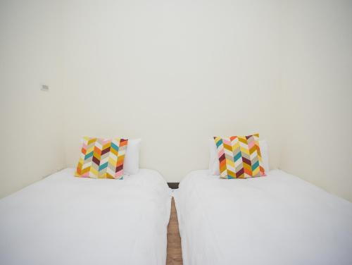 Postel nebo postele na pokoji v ubytování Happy Casa Resorts