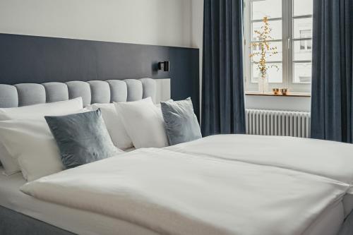 Кровать или кровати в номере Kremers Freiräume