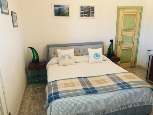 Posteľ alebo postele v izbe v ubytovaní Best Sardegna