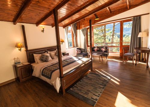 Postel nebo postele na pokoji v ubytování Aloka Resort