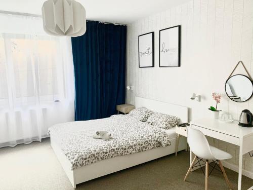 Una cama o camas en una habitación de Villa Vincentów