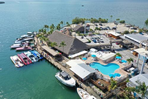 an aerial view of a marina with boats in the water at Gilbert's Resort in Key Largo