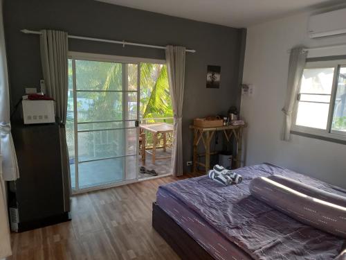 Postel nebo postele na pokoji v ubytování bungalow independant
