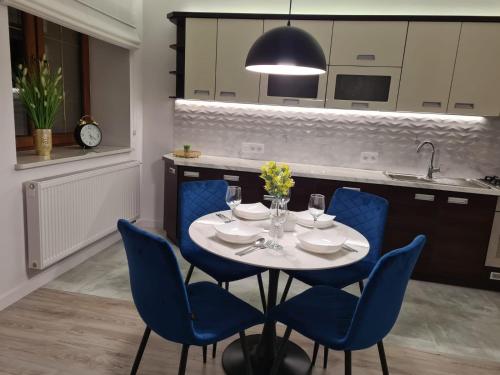 Kuchyň nebo kuchyňský kout v ubytování Apartament Mountains Góry Sowie
