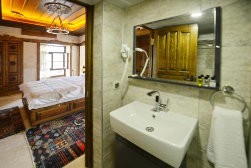 Ένα μπάνιο στο TÜRKMEN KONAGI HALFETİ BUTİK OTEL