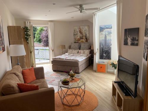 TV a/nebo společenská místnost v ubytování Villa "Auszeit"