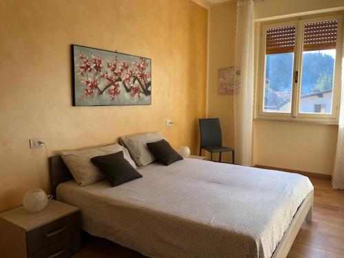 Posteľ alebo postele v izbe v ubytovaní Casa Teodoro - Gelsomino, Ulivi & Orchidea