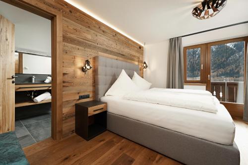 Postel nebo postele na pokoji v ubytování Runhof 47°10