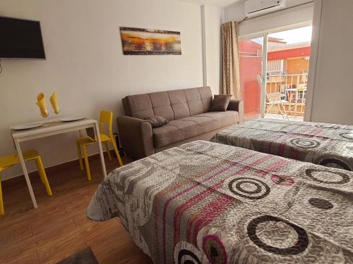 A bed or beds in a room at Beautiful Studio in Minerva