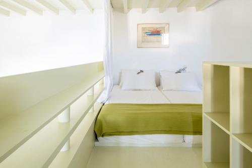 Katil atau katil-katil dalam bilik di Crossroads Inn Traditional Lodging