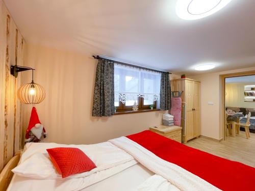 Ένα ή περισσότερα κρεβάτια σε δωμάτιο στο Apartament Jagodzianka Biały Dunajec