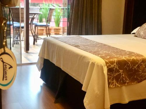 Cama o camas de una habitación en Hotel Lorimar