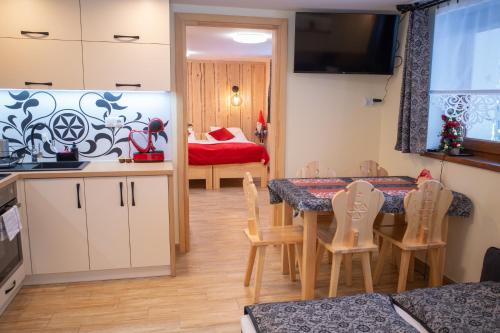 Postel nebo postele na pokoji v ubytování Apartament Jagodzianka Biały Dunajec