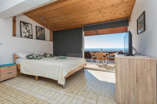 Posteľ alebo postele v izbe v ubytovaní Apartmani Češljar