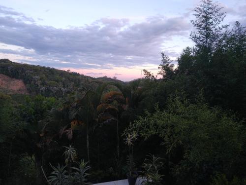 a view of a hill with trees and plants at Recanto das Orquídeas Domingos Martins- Soido De Cima,4km centro in Domingos Martins