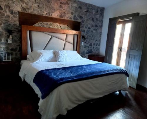 Postel nebo postele na pokoji v ubytování Hotel Canaria