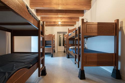 Ένα ή περισσότερα κρεβάτια σε δωμάτιο στο LORENTX ATERPEA