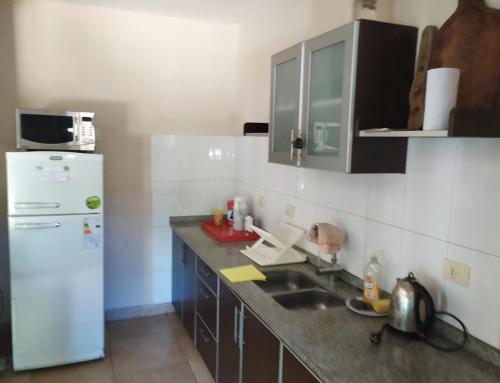 Una cocina o kitchenette en Alba Home