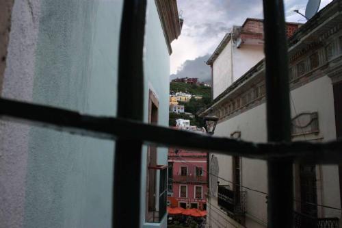 a view from a window of some buildings at Hotel de la Paz in Guanajuato