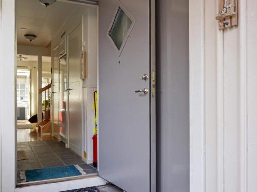 a hallway with a door leading to a room at 7 person holiday home in STRöMSTAD-By Traum in Strömstad