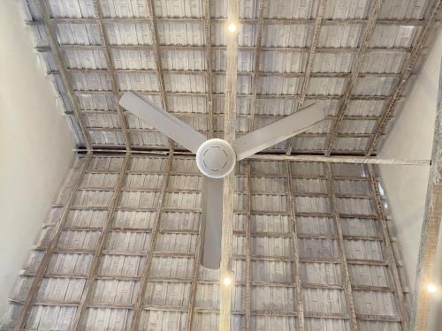 a ceiling fan hanging from the ceiling of a building at Kumbianna in Cartagena de Indias