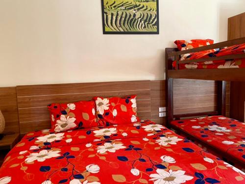 A bed or beds in a room at Sapa Garden Hotel