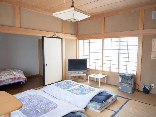 みんなの実家門脇家にあるテレビまたはエンターテインメントセンター