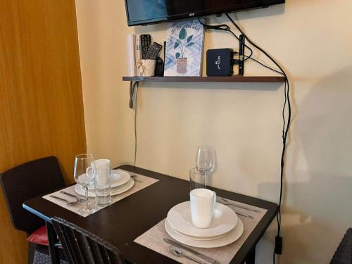 TV a/nebo společenská místnost v ubytování MOA staycation Shell Residences Pasay city darpm