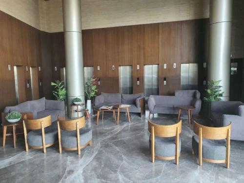 Coin salon dans l'établissement Weekend Address Managed By P.C Homes