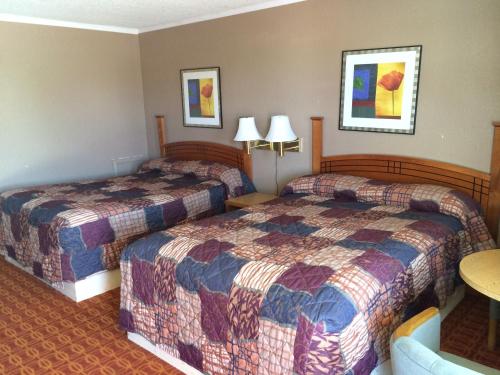 Voodi või voodid majutusasutuse Lake Shore Motel toas